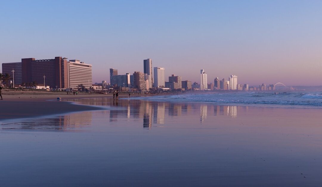 The KwaZulu-Natal coastline with a town behind the beach