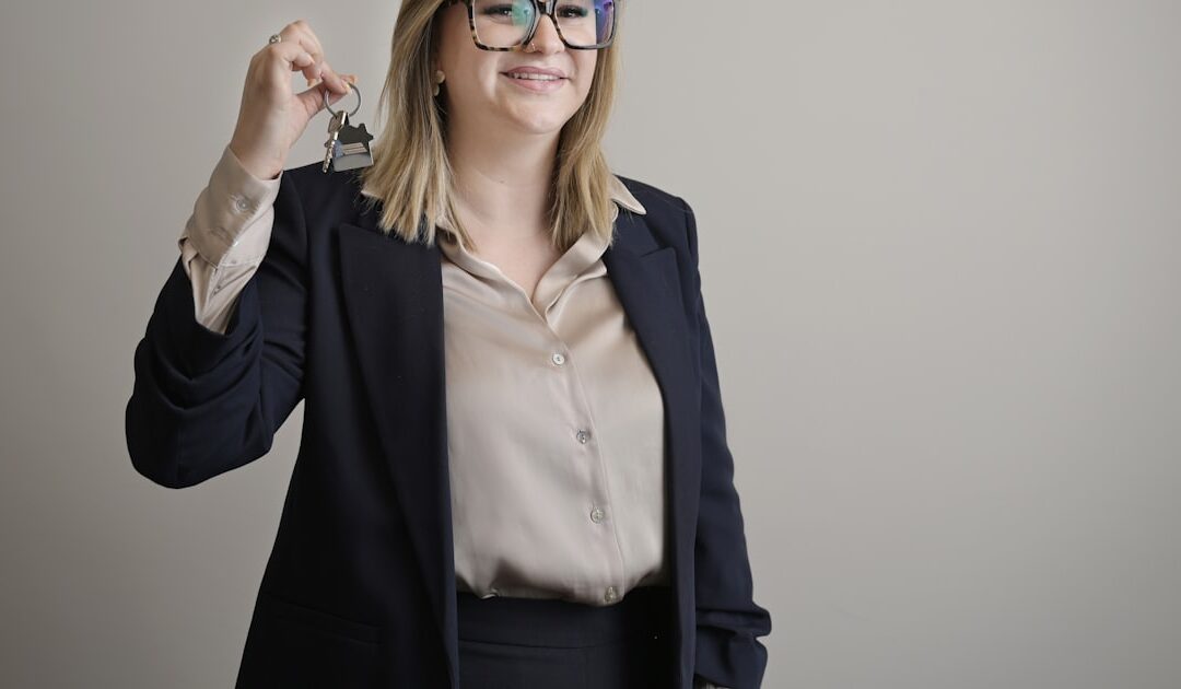 An agent handing over a set of keys